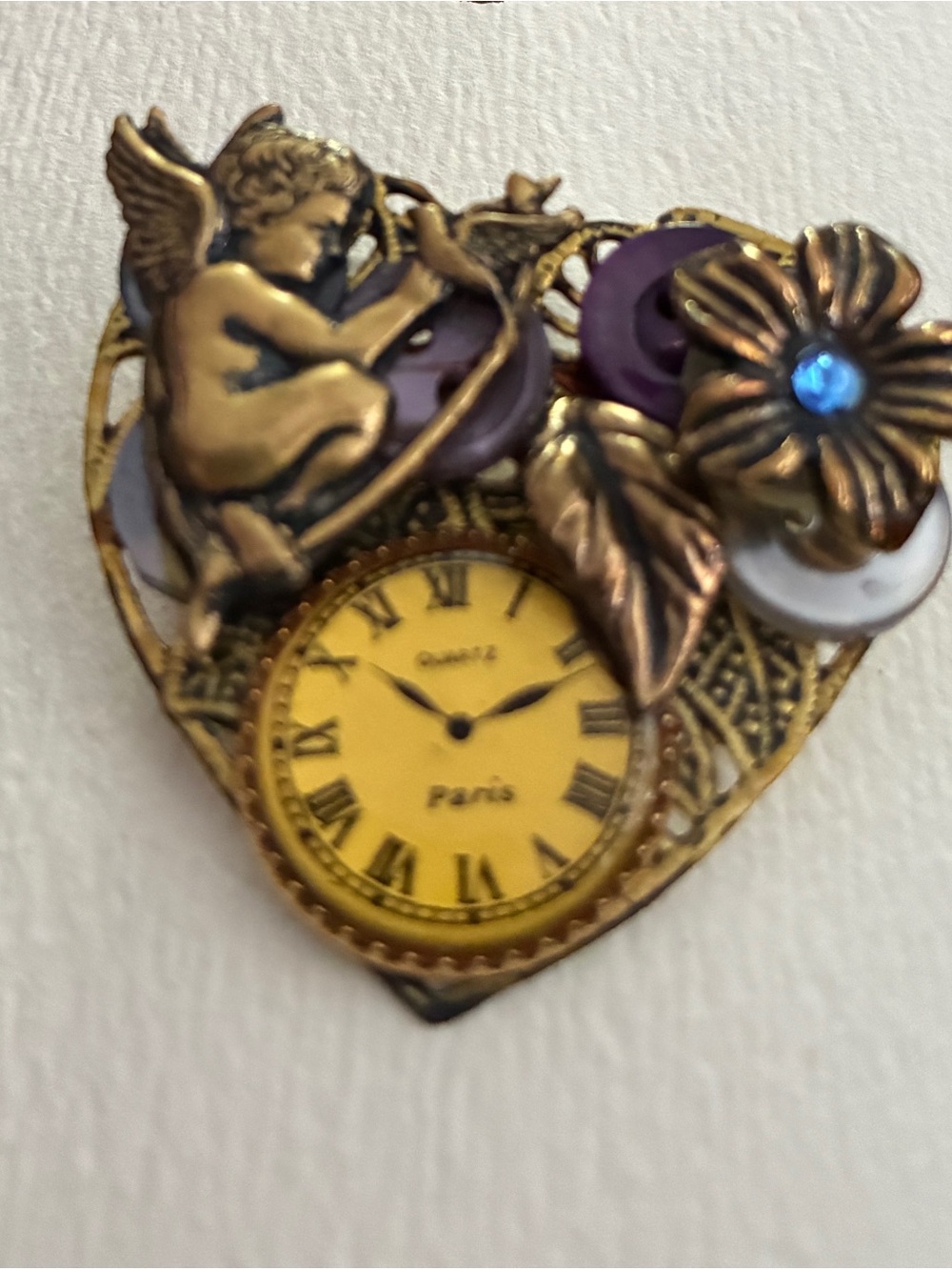 Vintage-Inspired Gold Cherub Heart Brooch with Yellow Clock and Purple Accents